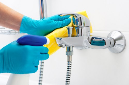 Cleaning desks and shared office surfaces in a Ruislip business premises