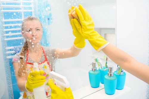 Professional cleaner carrying out a deep clean in a Ruislip property